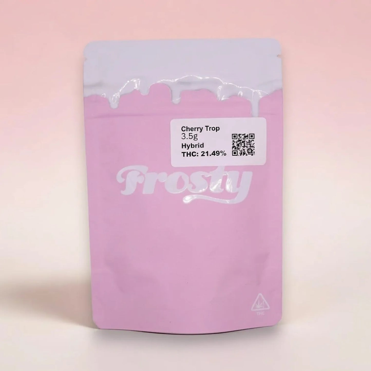 Pink packaging of 'Frosty' with cherry trop product details on a pink background