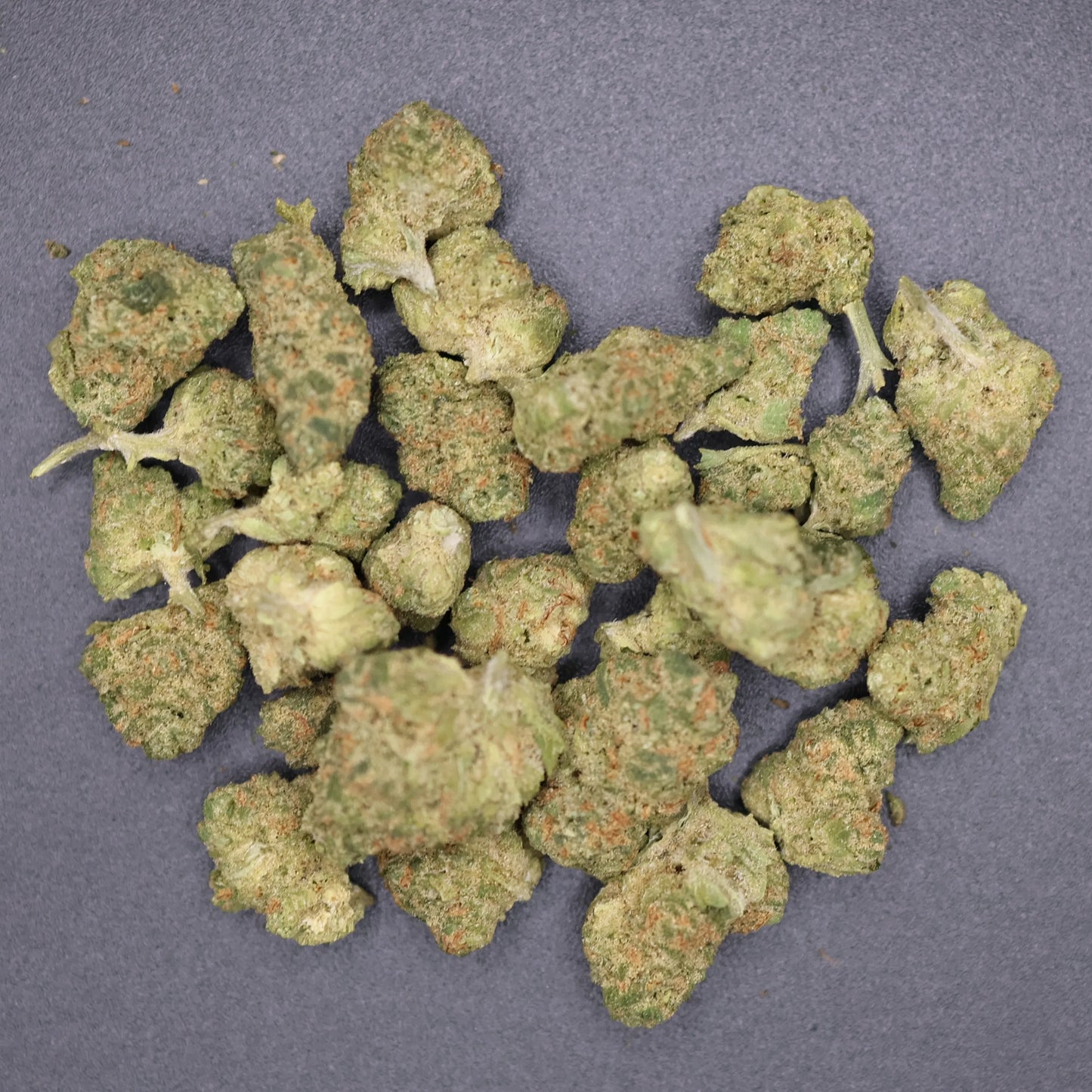 group of lemon pound cake thca buds in a pile 
