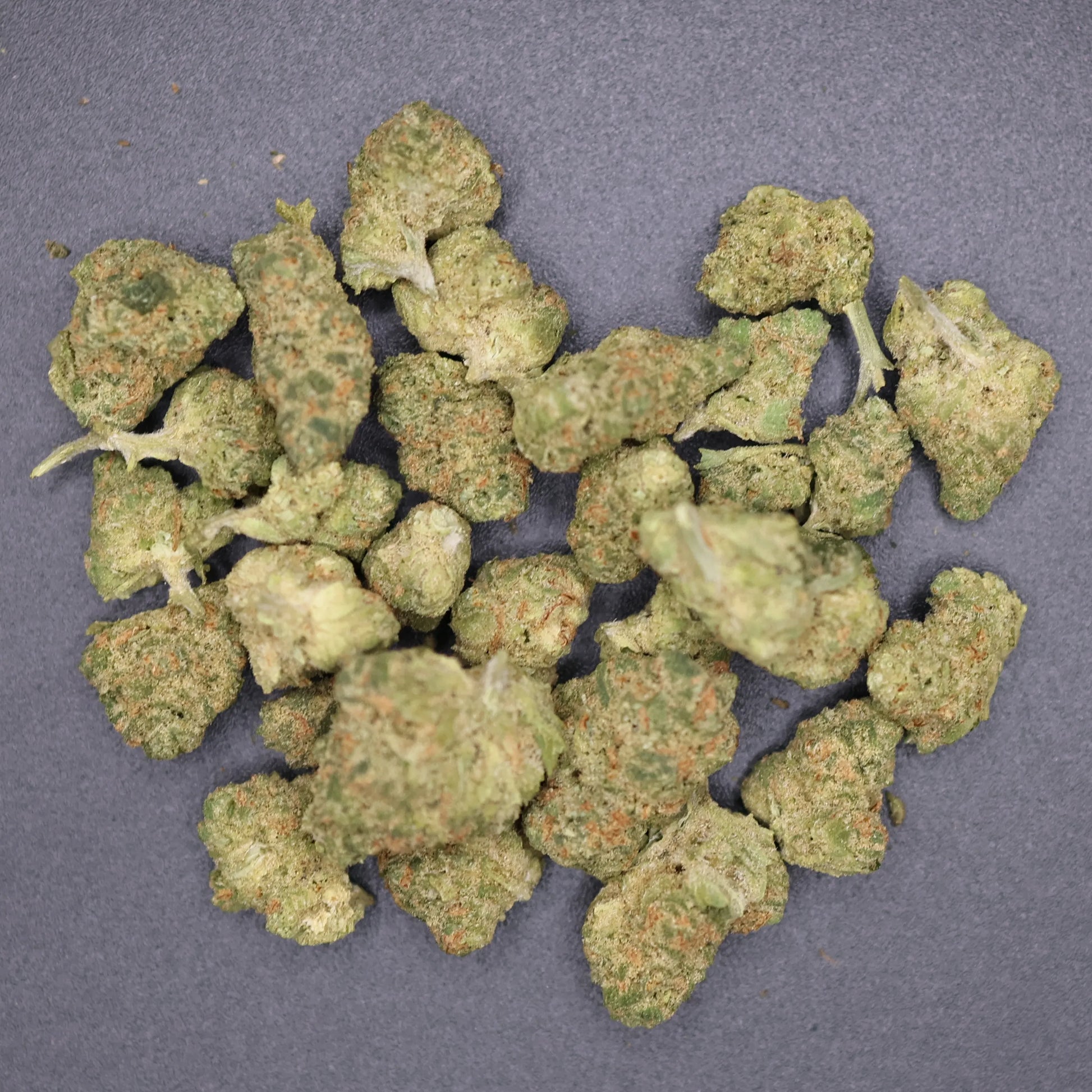 group of lemon pound cake thca buds in a pile 